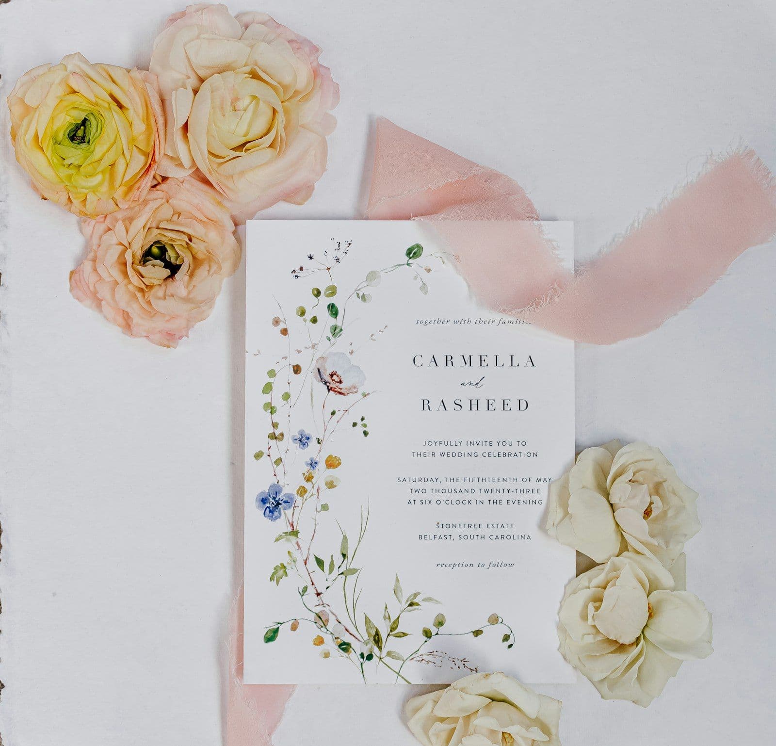 Hand-finished wedding stationery with ribbon