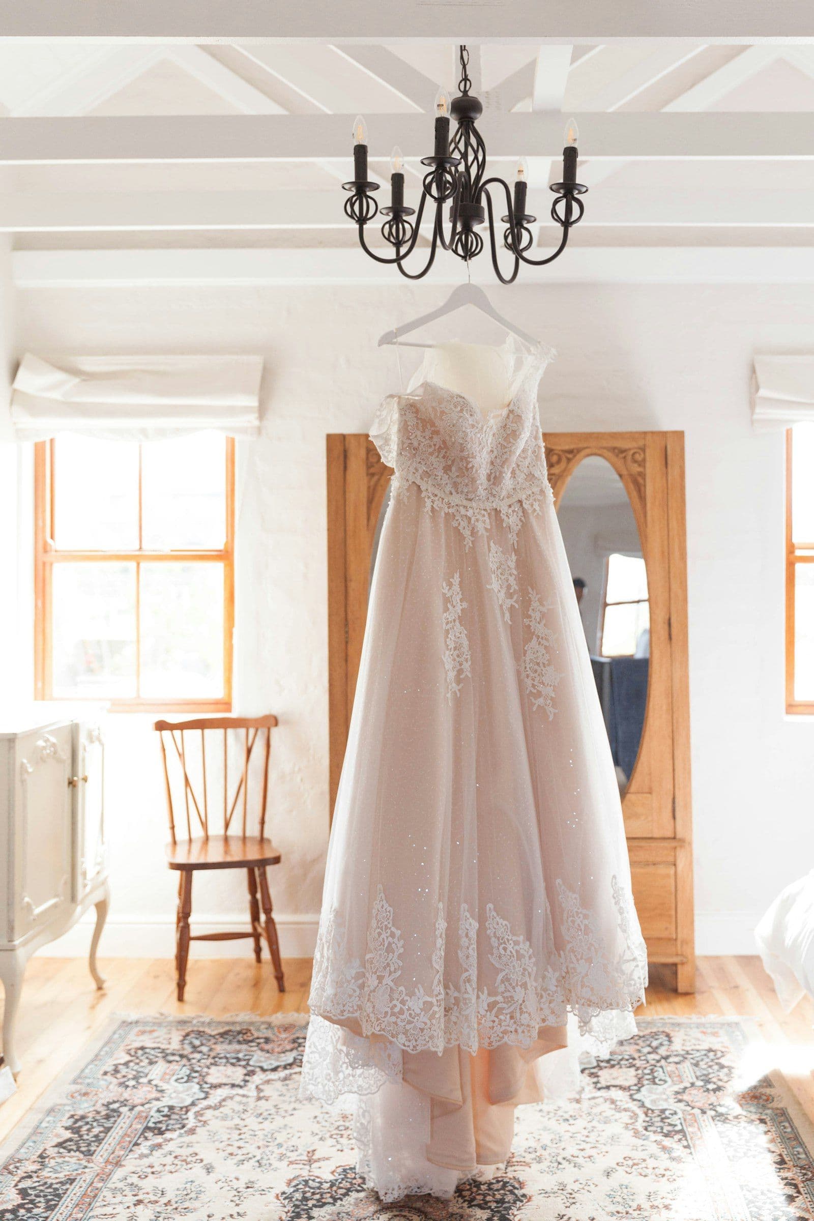 The gown waiting on its hanger