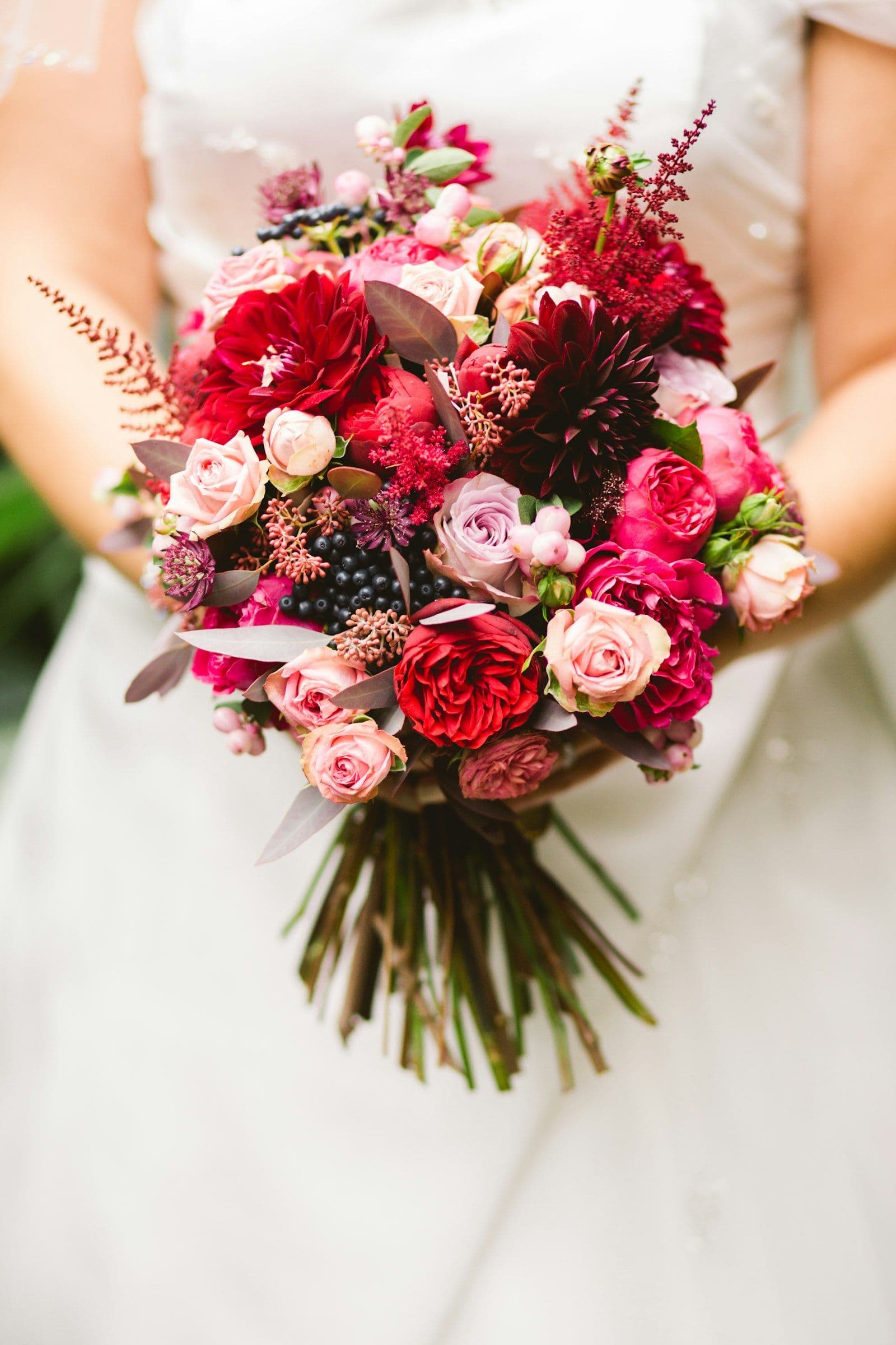 Leila holding her bouquet of garden roses